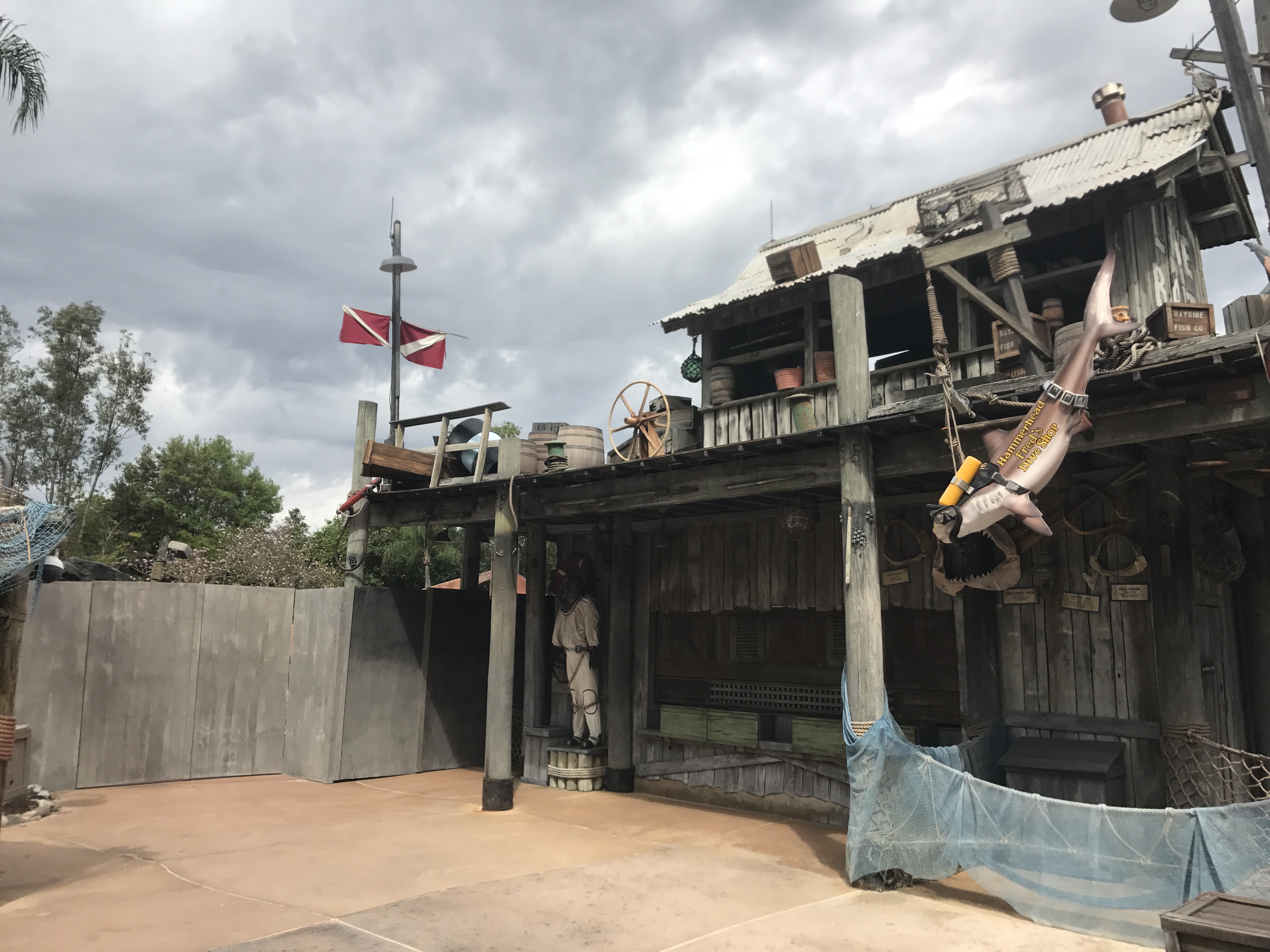 Shark Reef is still there physically, just shuttered.