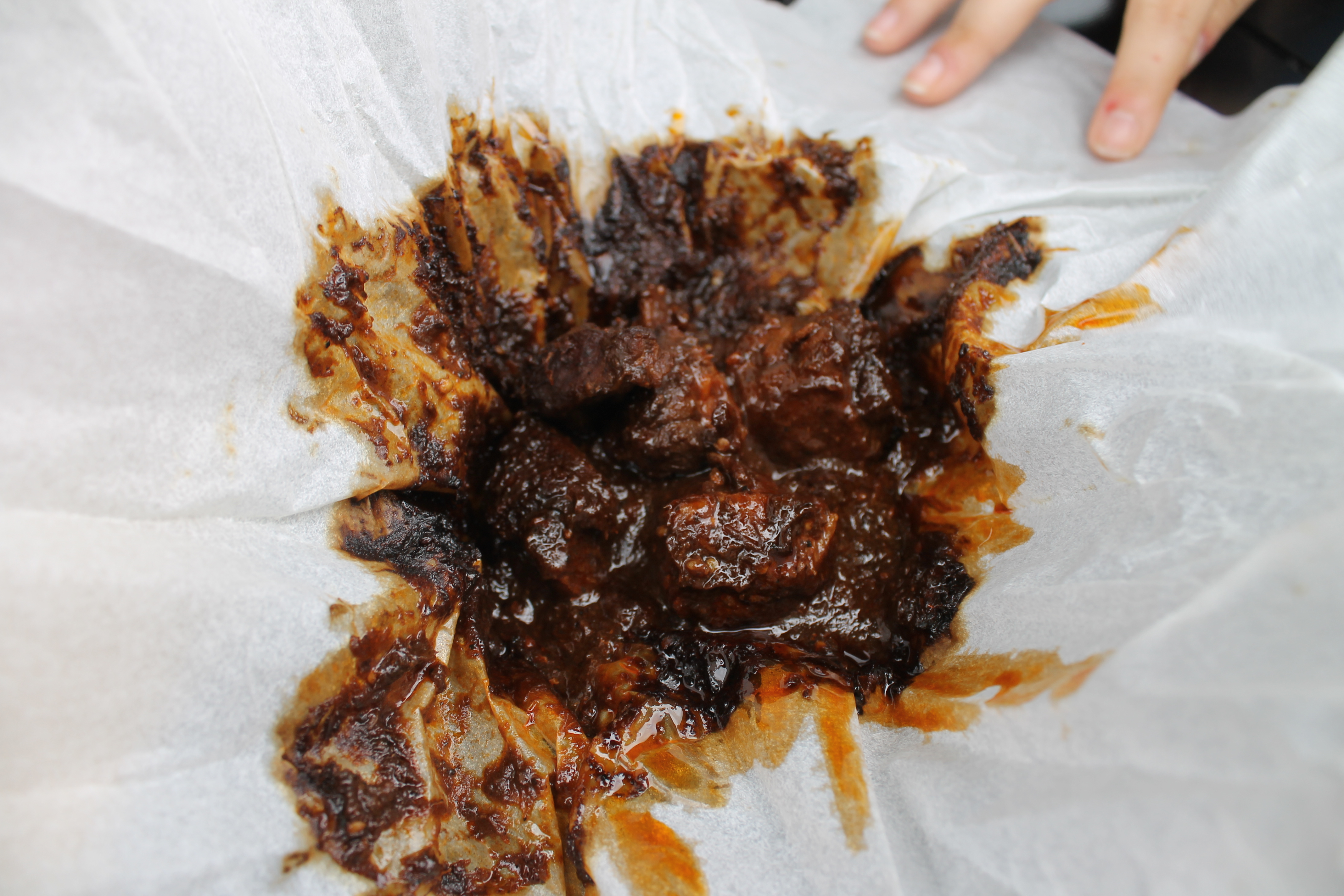 Mixiote de Cordero: Wrapped Slow Braised Lamb marinated in Tres Chiles Paste and Spices $8.95