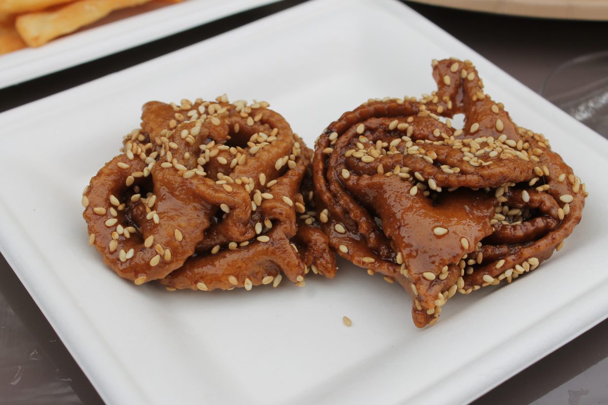 Chebbakia: Hand-twisted Strips of Fried Dough coated with Honey, Rosewater and Sesame Seeds $7.00