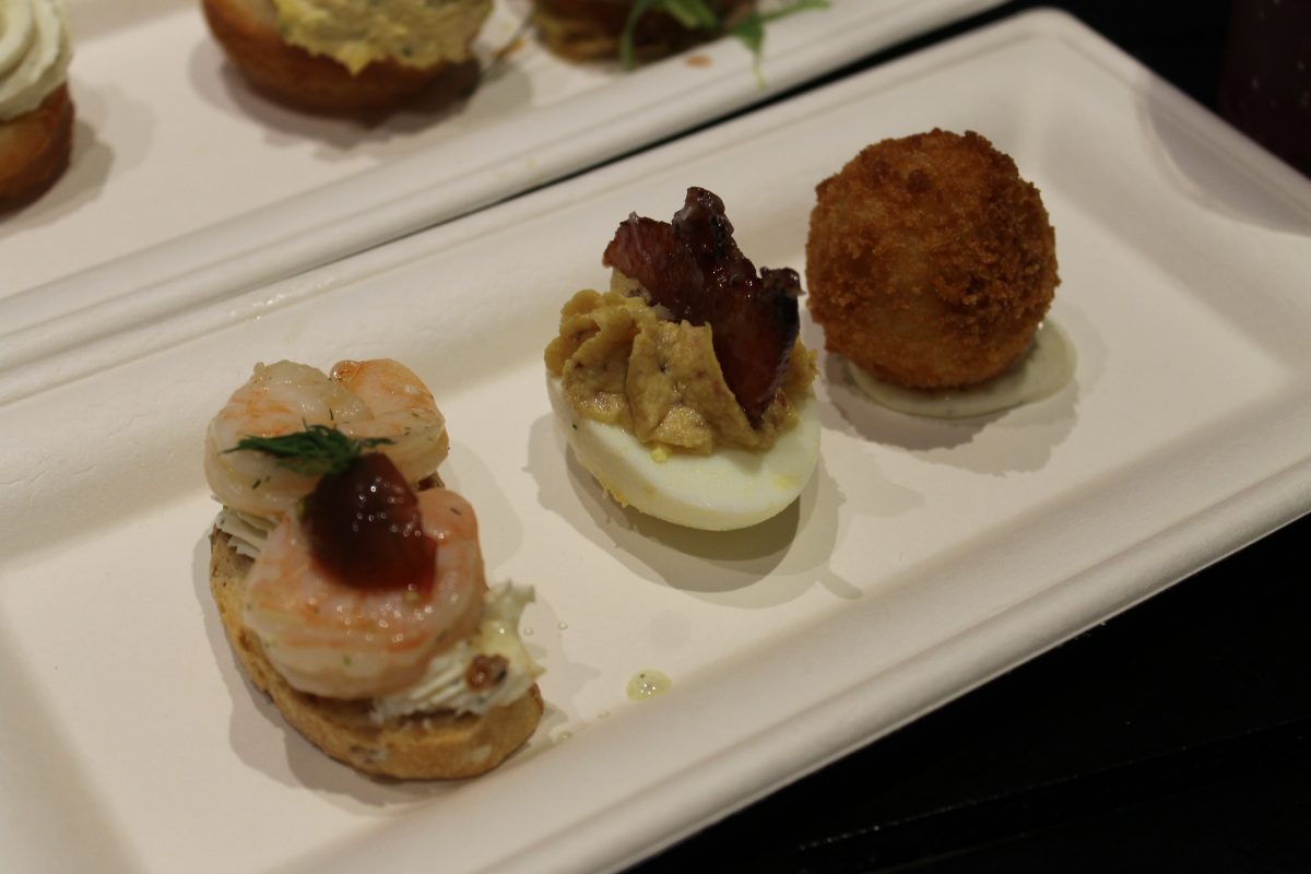 Gallery Bites: A Trio of Hors d&rsquo;Oeuvres : , Chilled Shrimp with Cucumber Cream Cheese on a Crostini, Traditional Deviled Egg with Candied Bacon, Crispy Truffled Risotto Ball with Stone-ground Mustard - $7.00