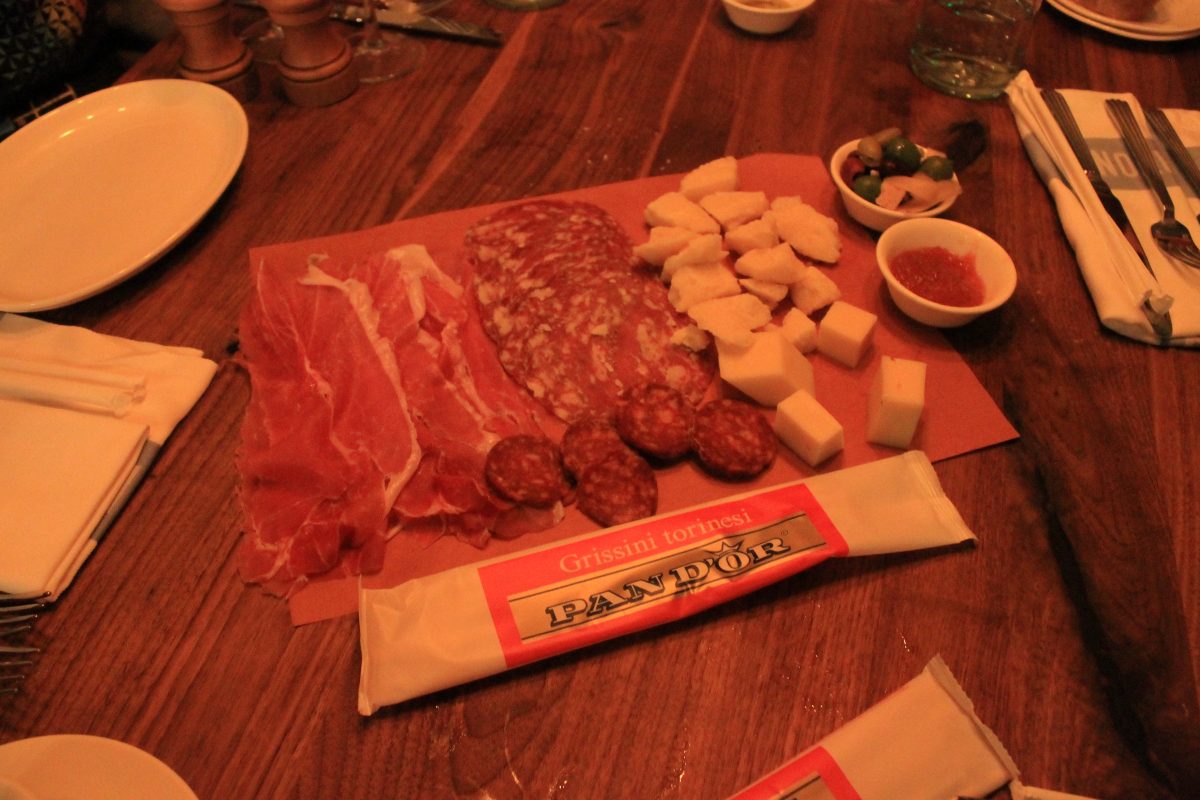 Salumi e Formaggi - Prosciutto cured 24 months, salami piccante, finocchinoa, aged 24 months regginao-parmigiano, pecorino Romano, Fontina Val d'Aosta, Caponata (assorted roasted vegetables), Giardiniera (pickled vegetables), Olives, Grissini (bread sticks) - $17 per person, two person minimum.