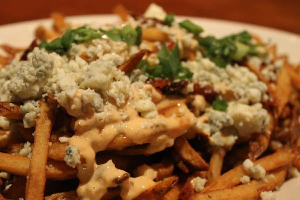 Electri-Fries - L. Burbank Hand Cut Potatoes, 'Edison Special Sauce', Bacon, Crumbled Blue Cheese, Chopped Green Onion - $12.00