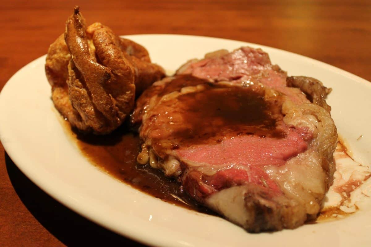 28 Day Dry-Aged Prime Rib - Horseradish-Black Pepper Crust, Au Jus, Cheddar Popover - QUEEN CUT Boneless 18oz - $29.00