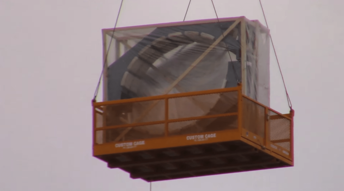 Installing the Millennium Falcon at Star Wars: Galaxy's Edge at Disneyland