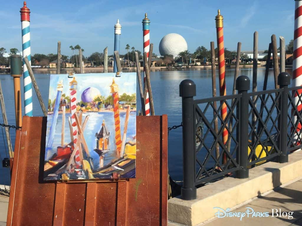 A painting done of the paline on the waterfront at Italy in the World Showcase at Epcot during Festival of the Arts.