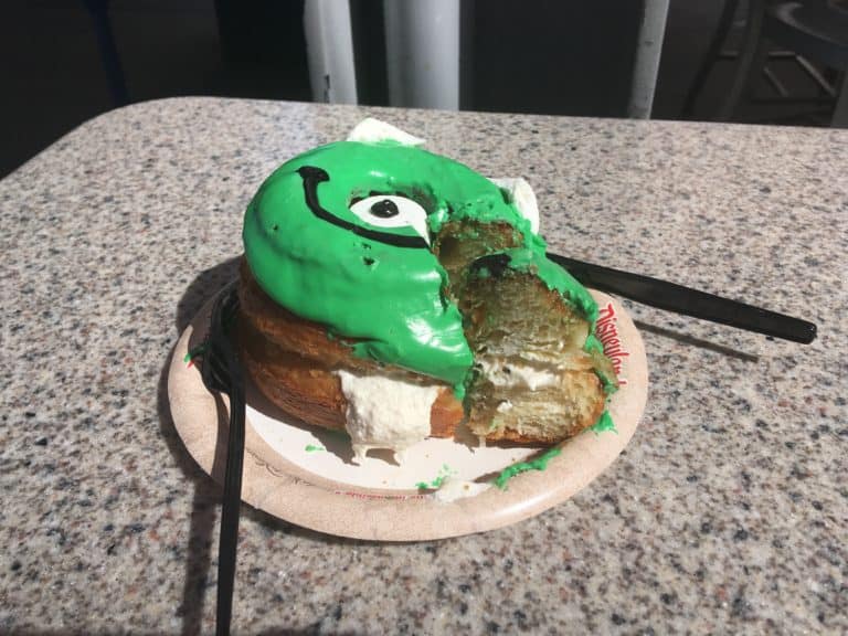 A cross-section of the Mike Wazowski-themed Monster Mallow donut, created for the Disneyland Resort's PIXAR Fest and sold at Disney California Adventure's Shmoozies