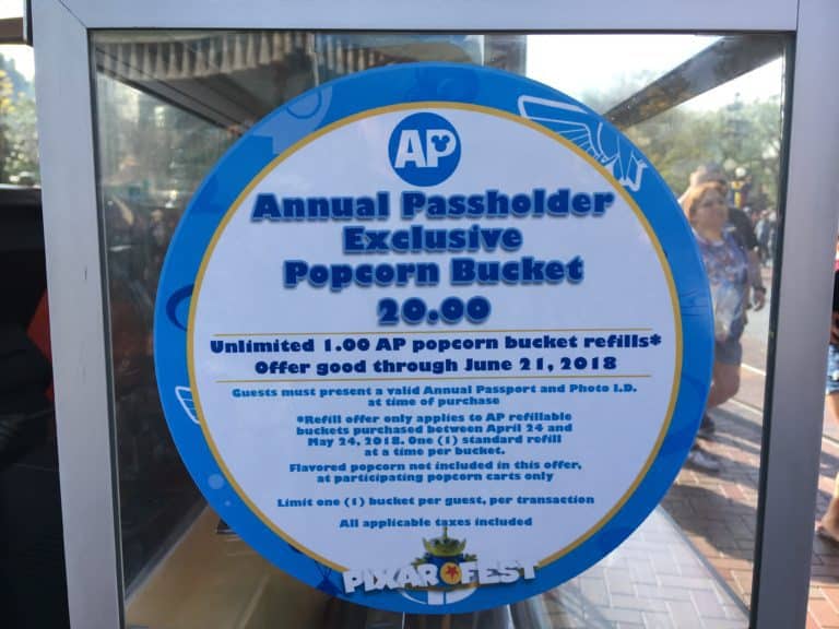 The fine print and price of the Annual Passholder-excluisve popcorn bucket for Disneyland's PIXAR Fest