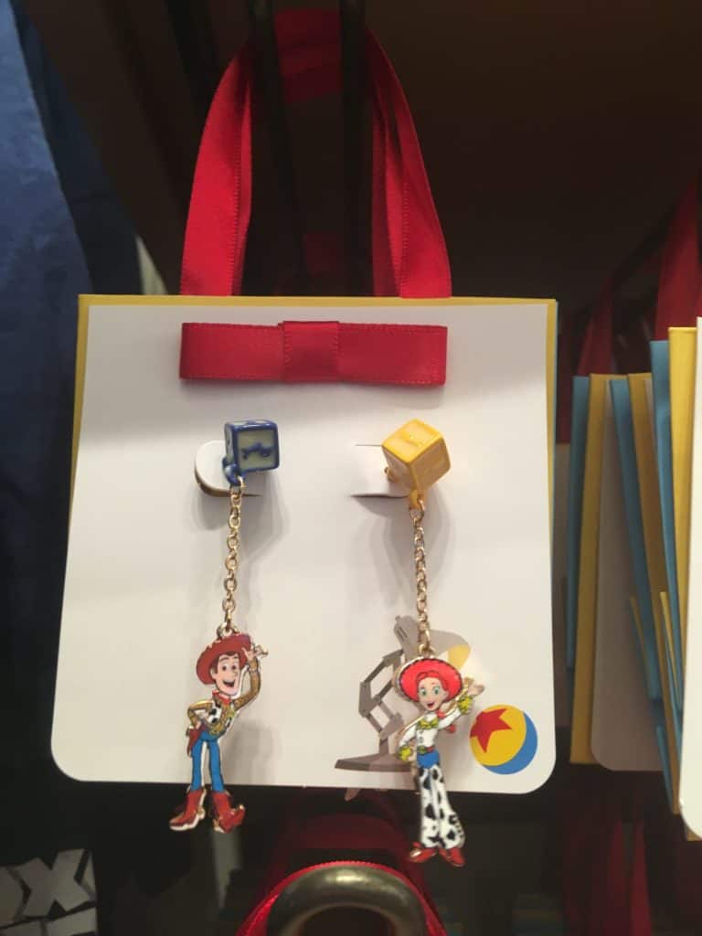 a pair of Toy Story earrings from the new PIXAR jewelry line
