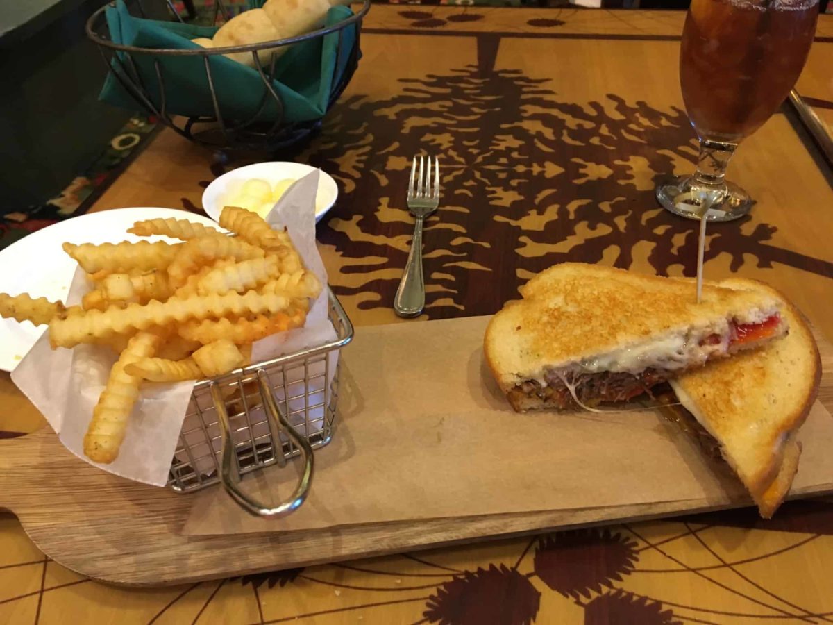 A plate of the Short Rib Grilled Cheese served at Storytellers Cafe at the Grand Californian Hotel