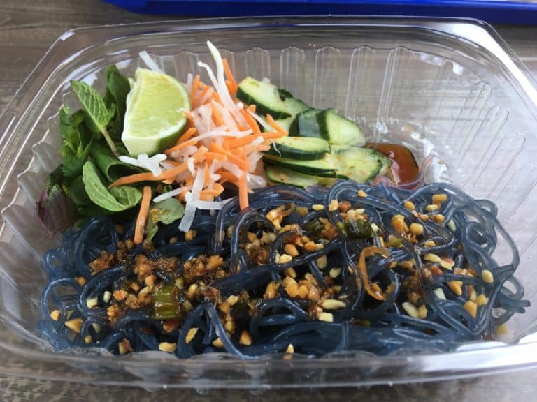 PIXAR Fest's Chilled Noodle Salad with the vinaigrette poured on top 