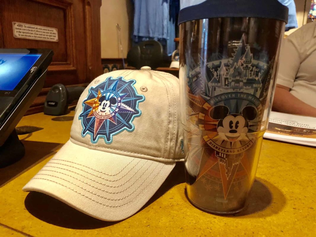 The hat and Tervis tumbler available exclusively to annual passholders at the Disneyland Resort