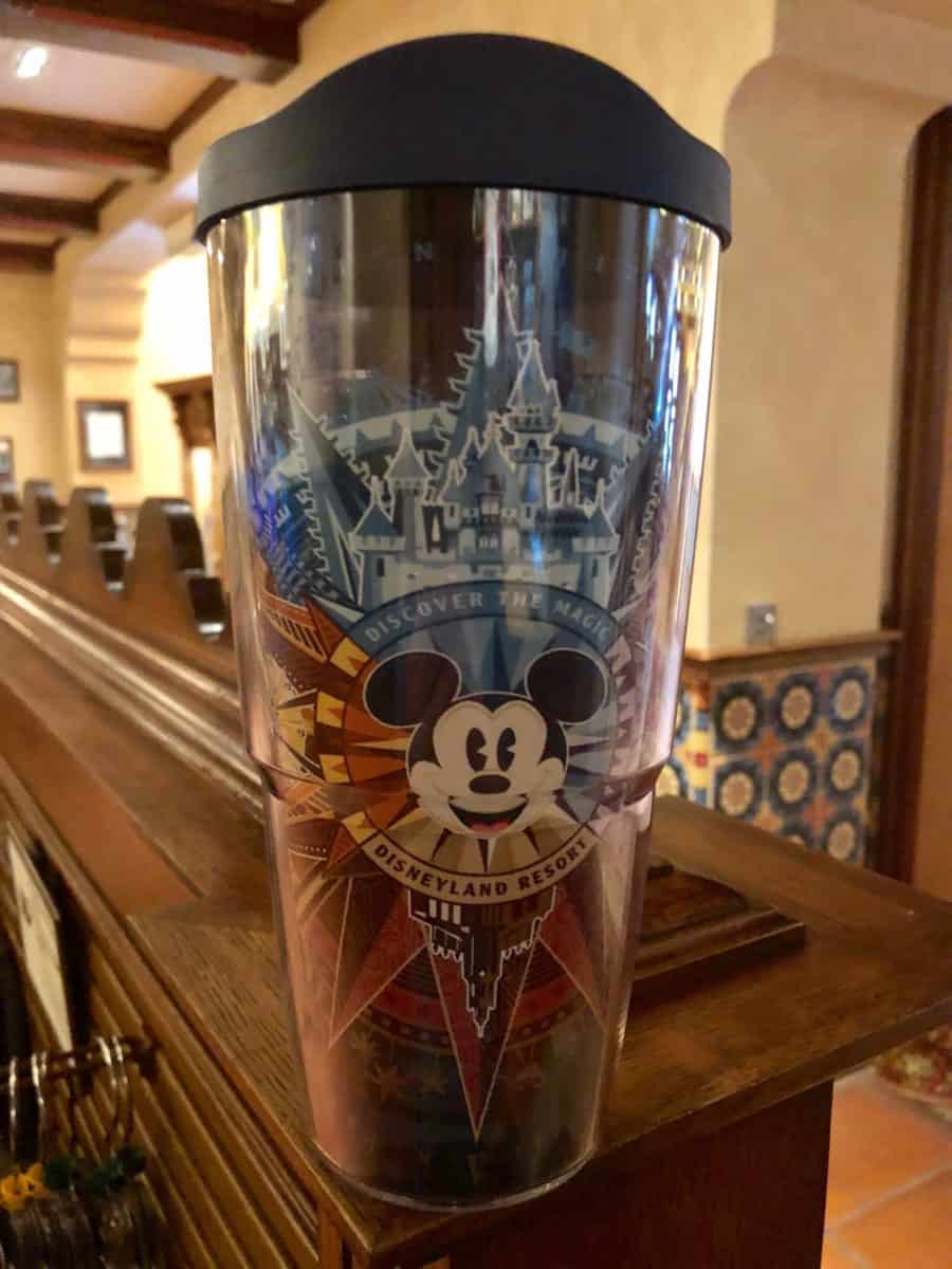 The compass emblem on the Disneyland Annual Passholder-exclusive Tervis Tumbler, part of the "Discover the Magic" line
