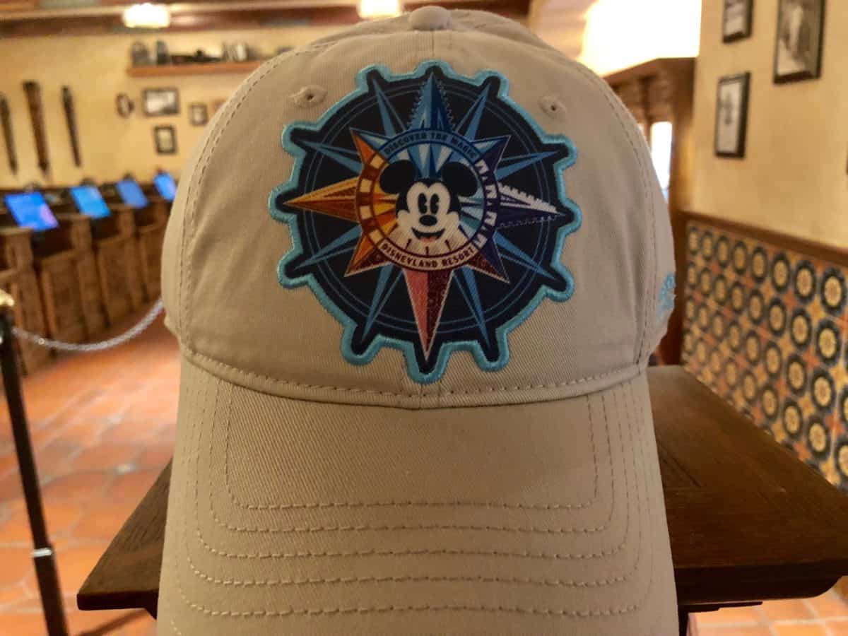 The front of the Disneyland Annual Passholder-exclusive baseball cap, part of the "Discover the Magic" line