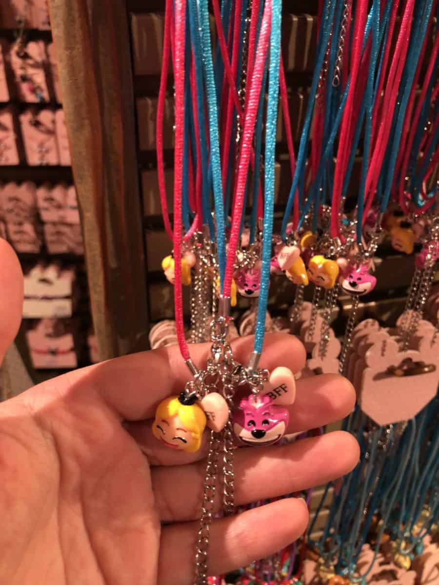 Disney Emoji Best Friend necklace set themed to 'Alice in Wonderland,' as seen on May 10, 2018