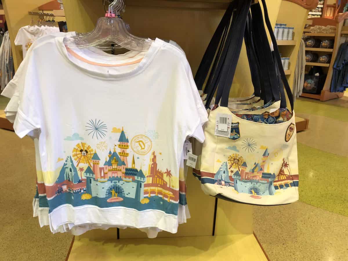 The purse and women's tunic from the "Discover the Magic" collection is restocked at World of Disney in Disneyland's Downtown Disney District (photo taken May 15, 2018)