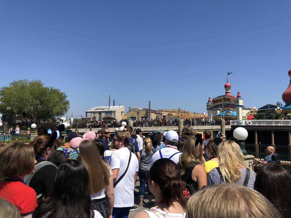 Crowd waiting to enter Pixar Pier Premiere