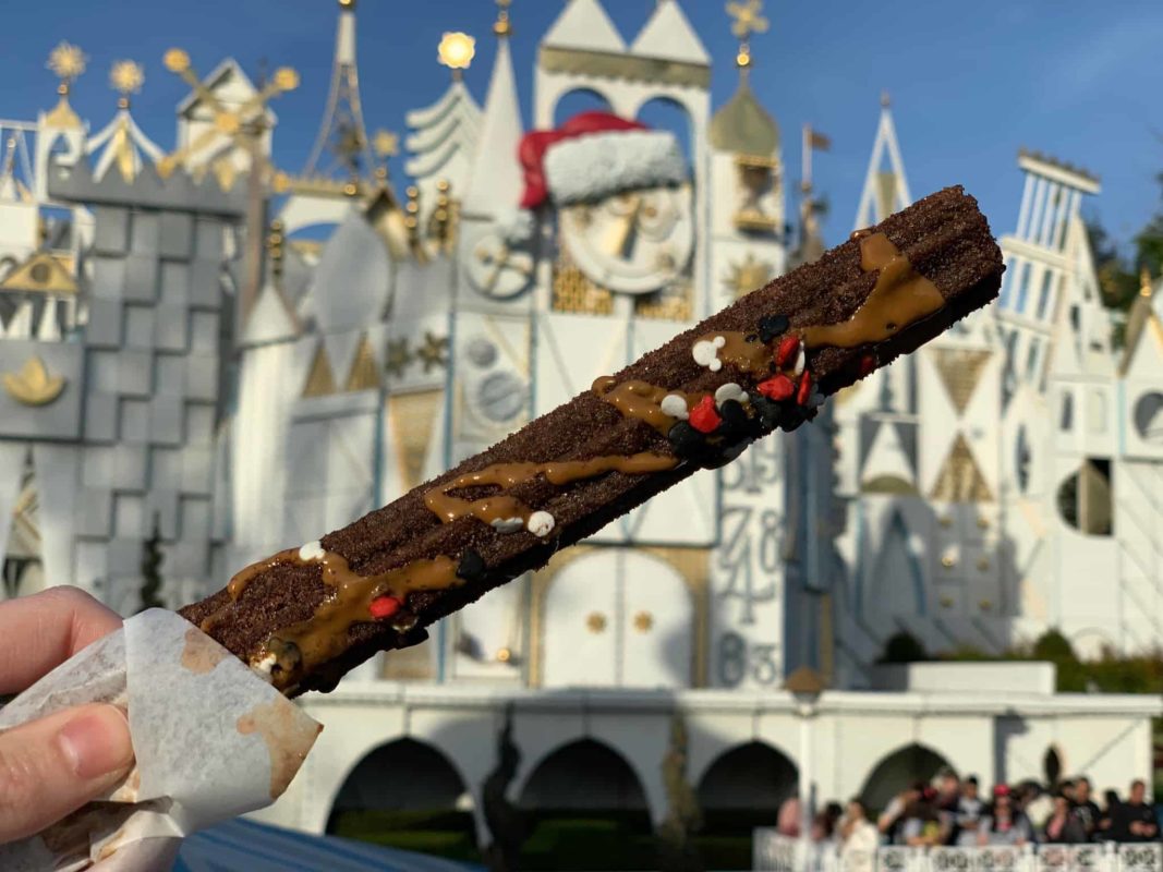 mickey mouse celebration churro disneyland resort small world promenade churro cart