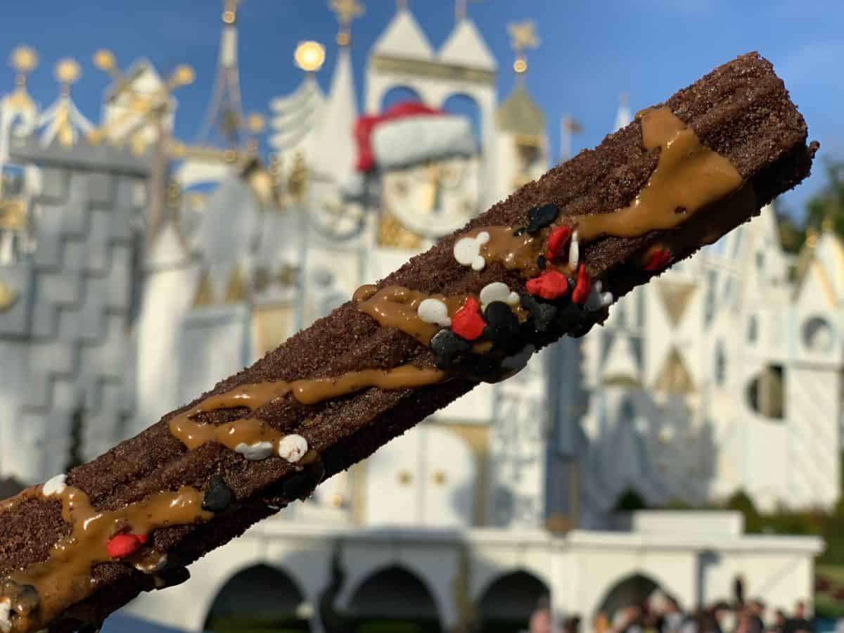 mickey mouse celebration churro disneyland resort small world promenade churro cart