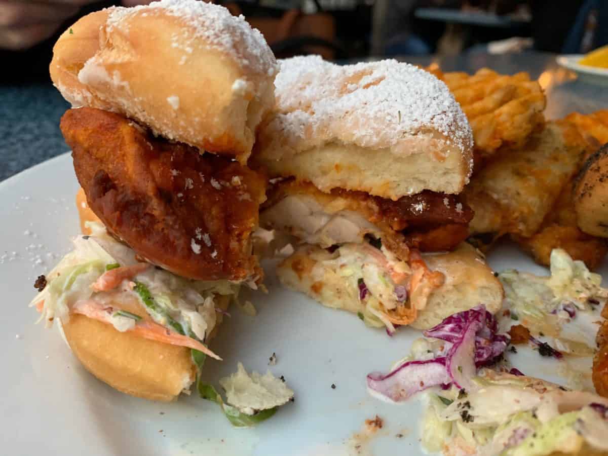 fried chicken and beignets and birthday cake mickey beignets cafe orleans disneyland park