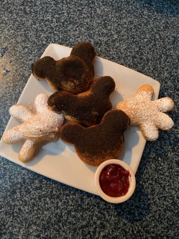 fried chicken and beignets and birthday cake mickey beignets cafe orleans disneyland park