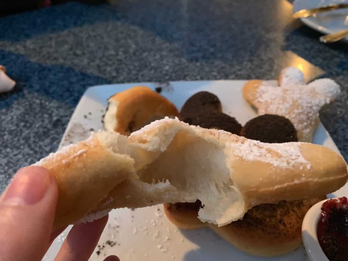 fried chicken and beignets and birthday cake mickey beignets cafe orleans disneyland park