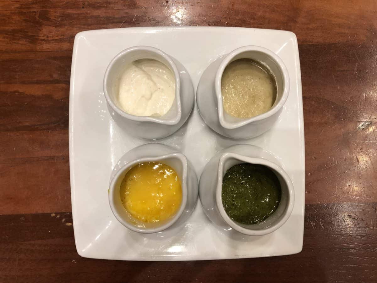 Green Peppercorn, Poly-Churri, Togarashi Hollandaise, and Horseradish Cream kona cafe polynesian resort walt disney world