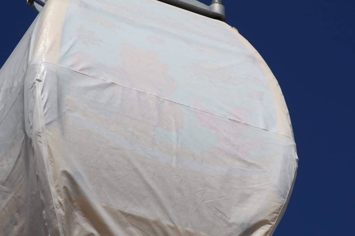 disney skyliner gondolas designs beneath tarps full capacity