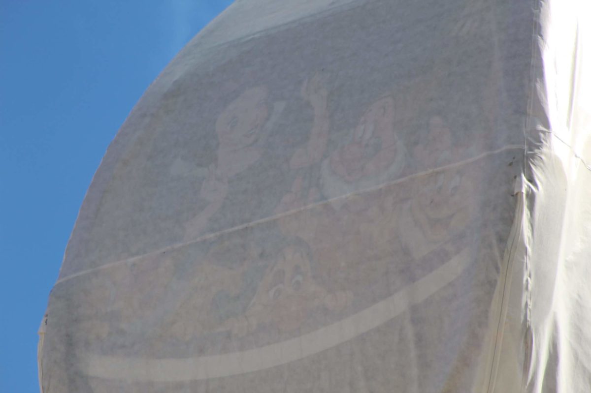 disney skyliner gondolas designs beneath tarps full capacity