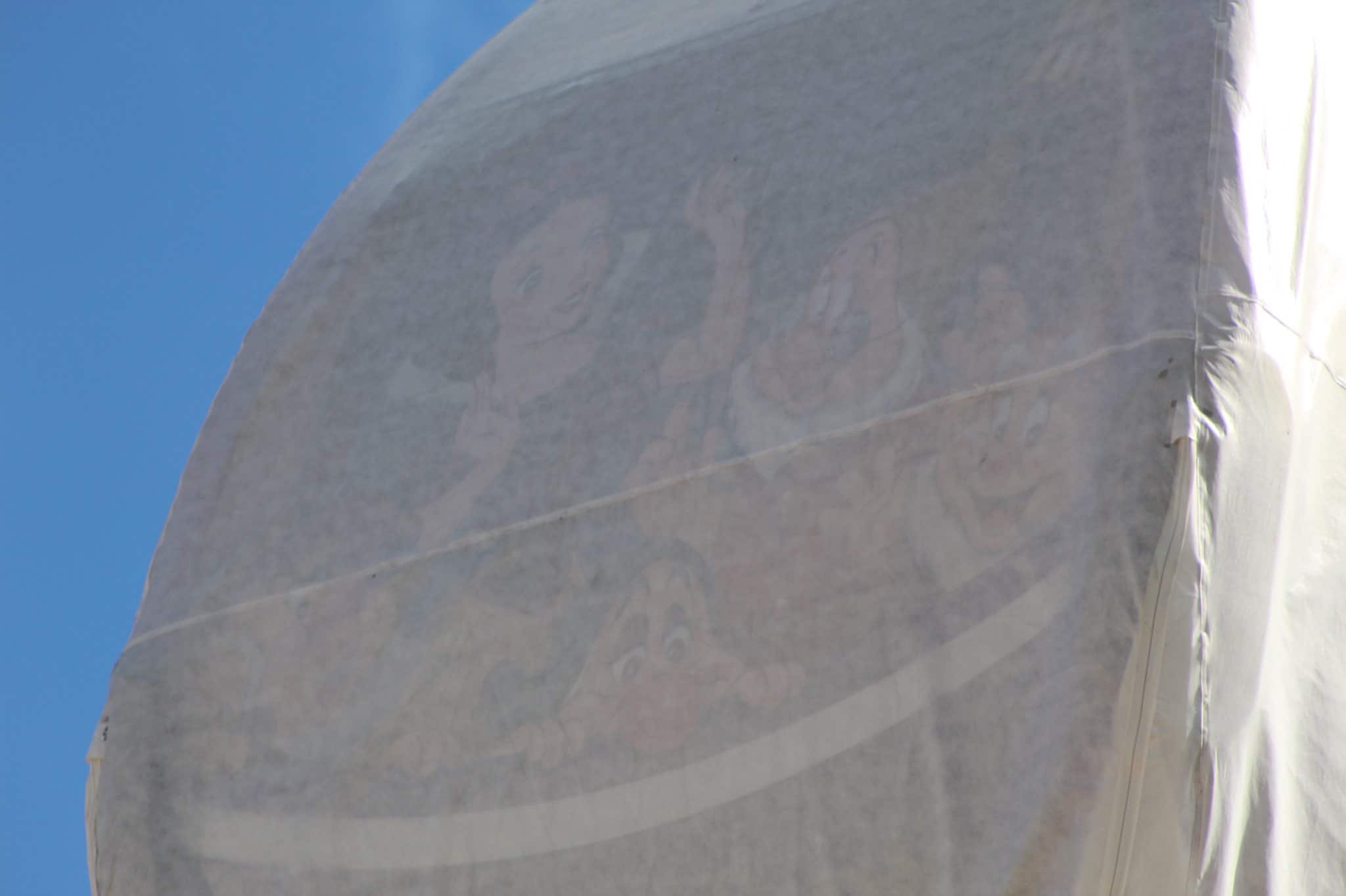 disney skyliner gondolas designs beneath tarps full capacity