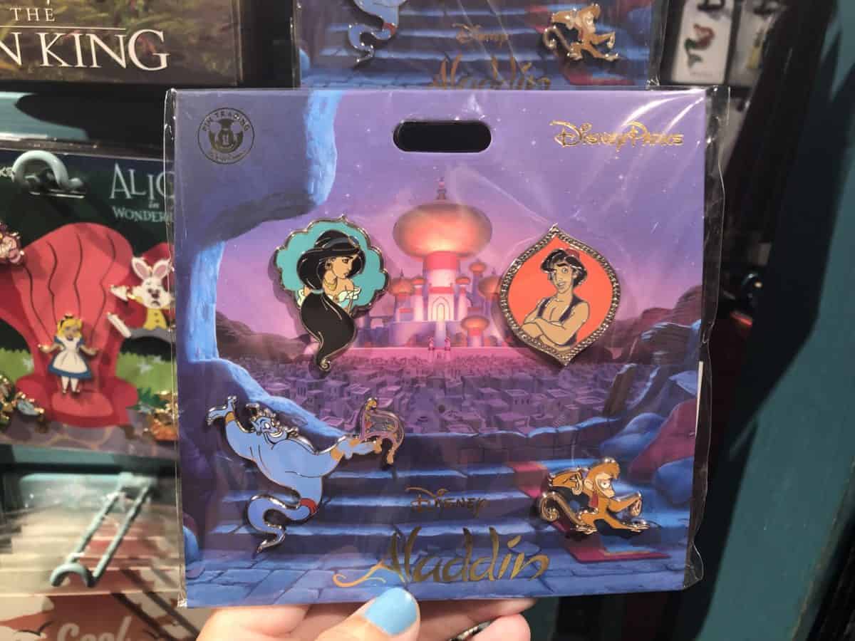 4 pin set of animated Genie an Carpet, Abu, Aladdin, and Jasmine