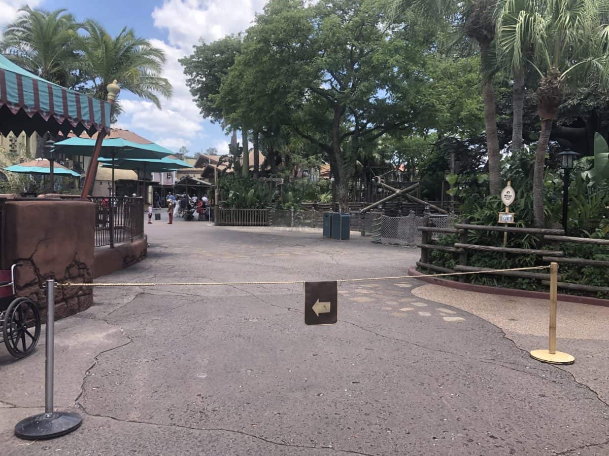 Adventureland roped off by cast members in front of Magic Carpets of Aladdin