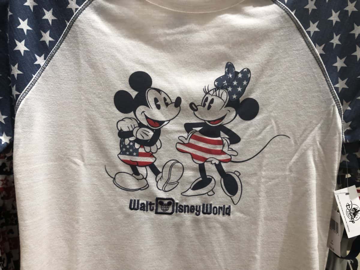 Mickey and Minnie dressed in red, white, and blue with Walt Disney World logo