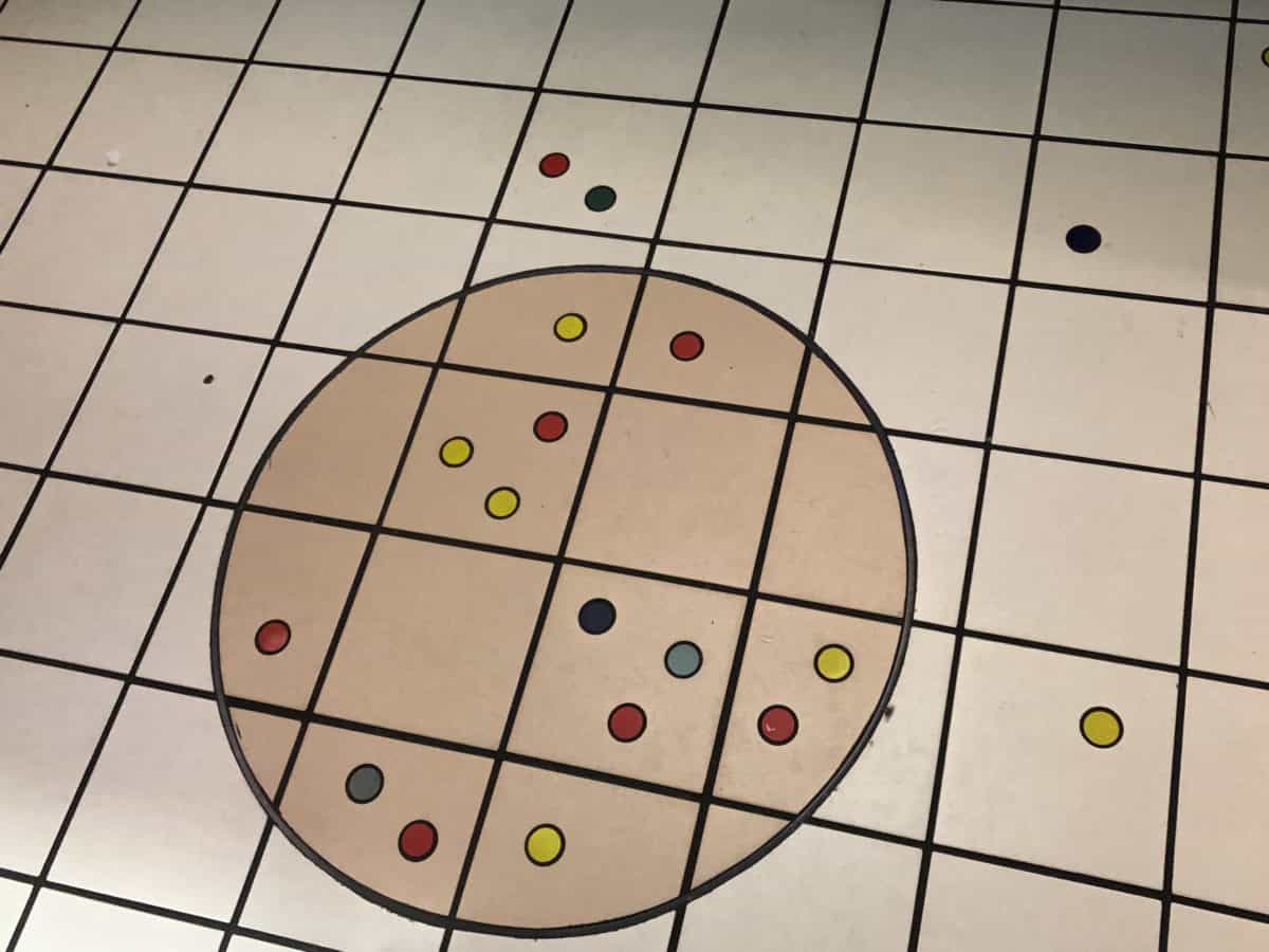 Cirque du Soleiul bathroom floor with colorful circles in the tile