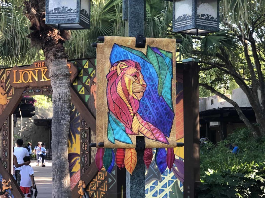 Colorful Adult Lion Banner with more brightly colored leaves hanging underneath