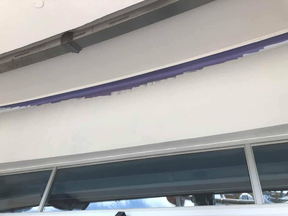 Merchant of Venus entrance painting, the purple is visible at the edges