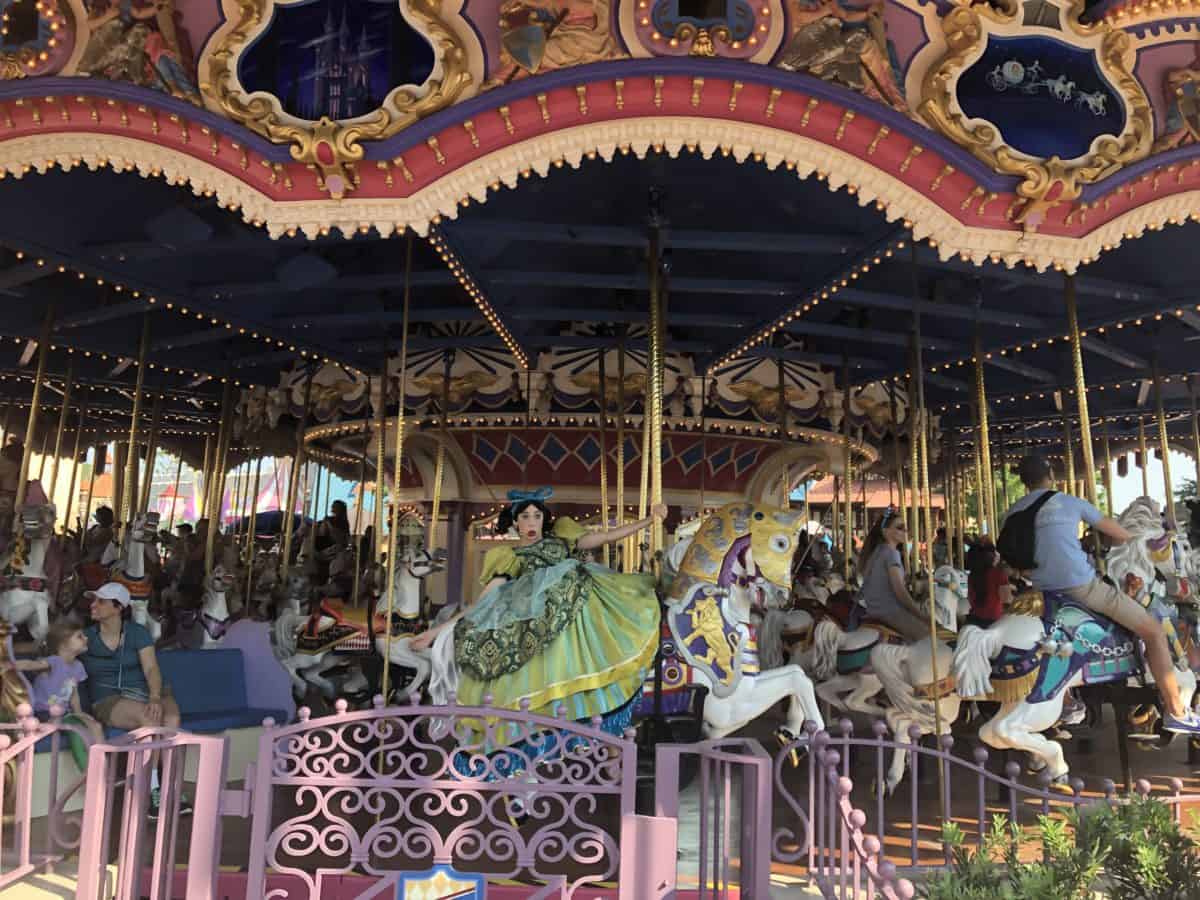 Cinderella's Ugly Stepsister riding on the carousel
