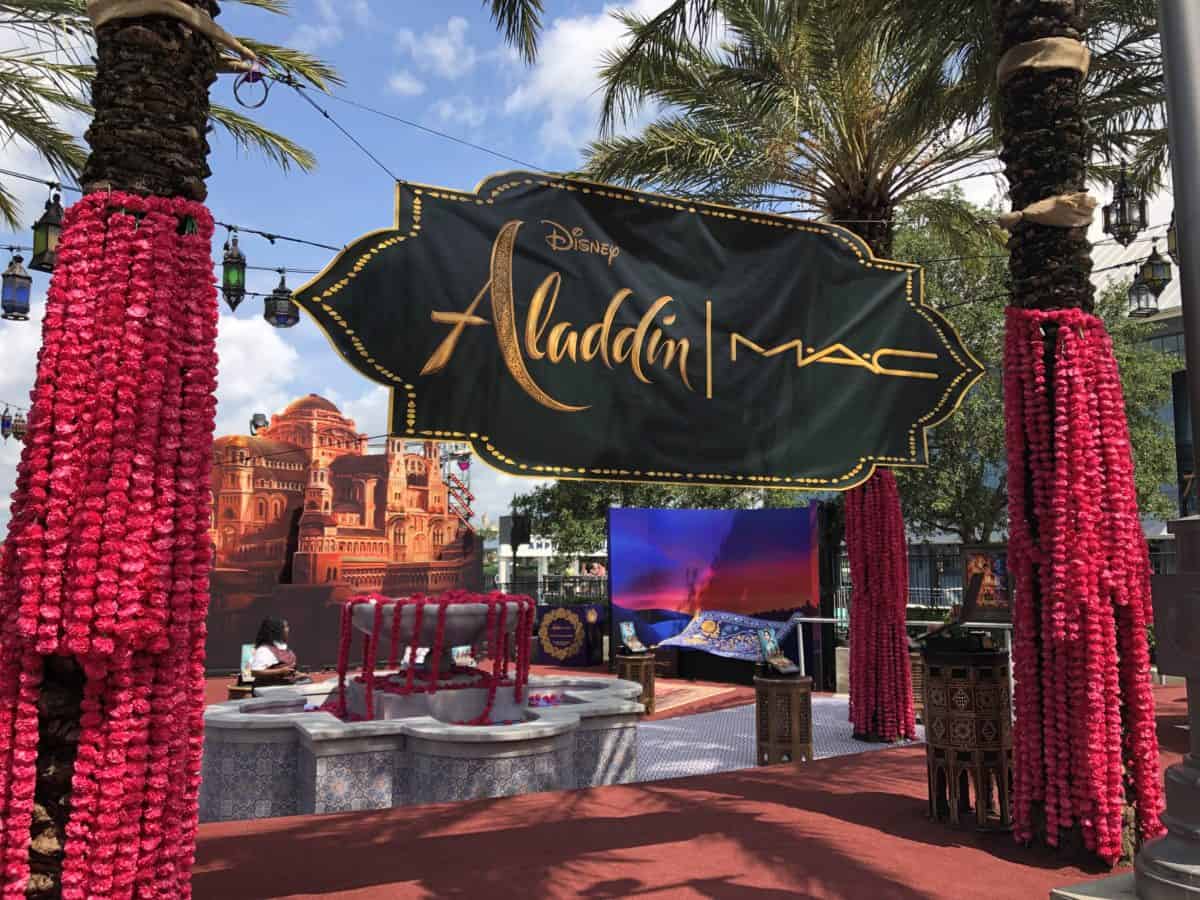 The Aladdin MAC Event sign at Disney Springs