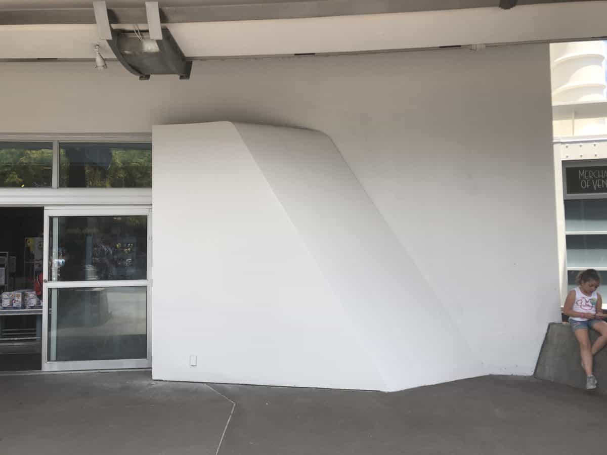 Merchant of Venus Wall Painting, purple is visible through the white base coat coloring