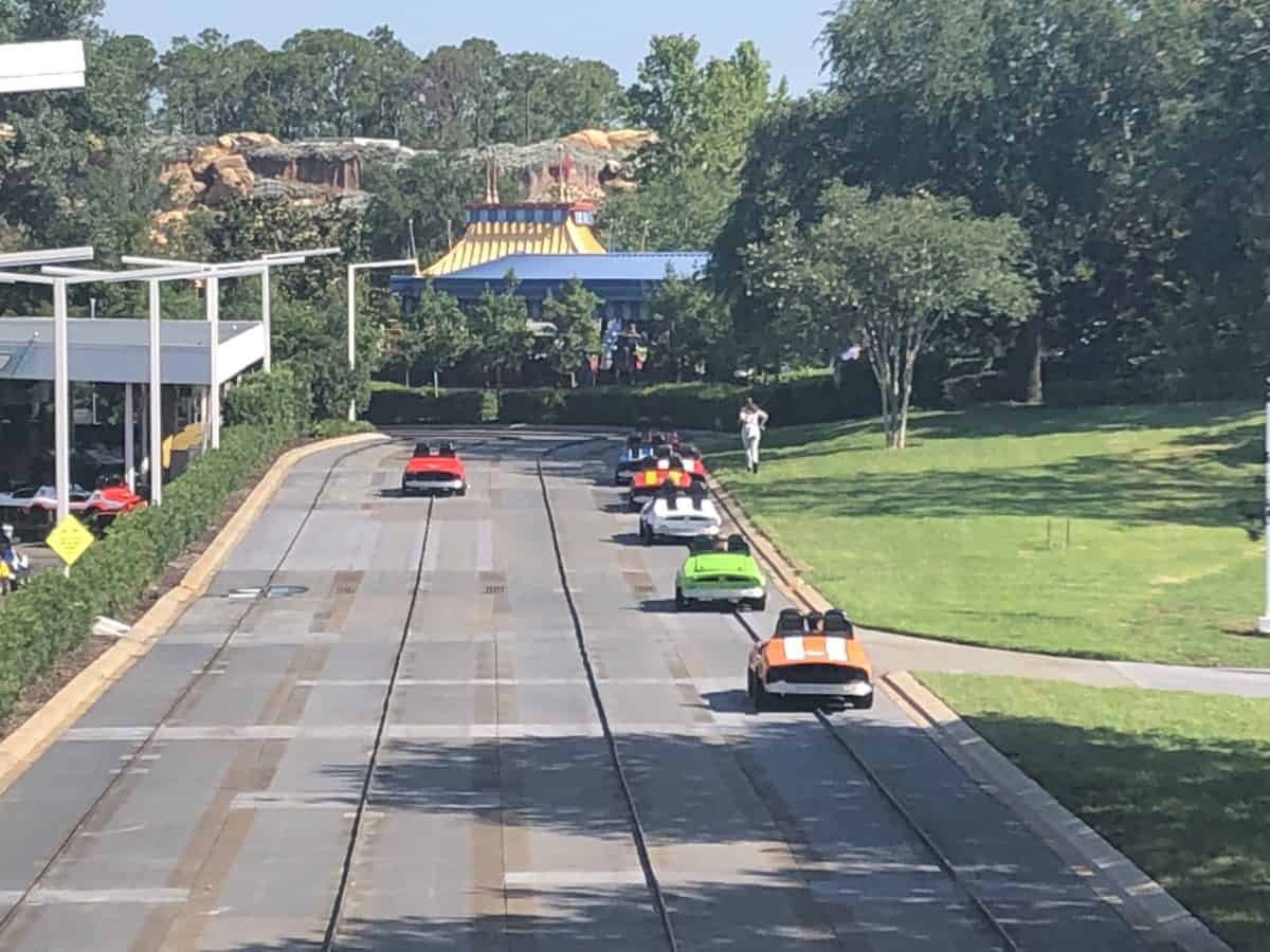 Cars backed up on the Tomorrowland Speedway track due to one car stalling on the track