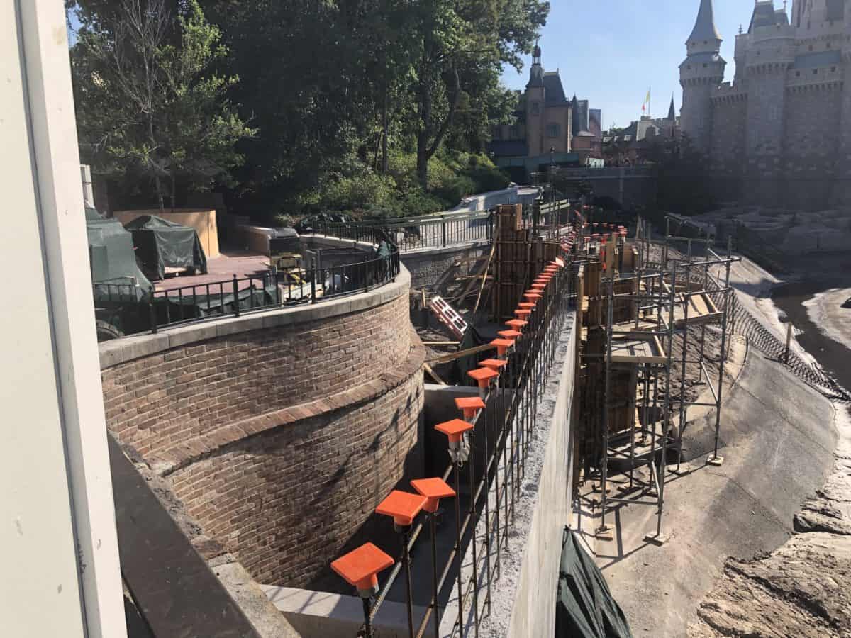 Magic Kingdom Pathway Widening Project walls in the moat