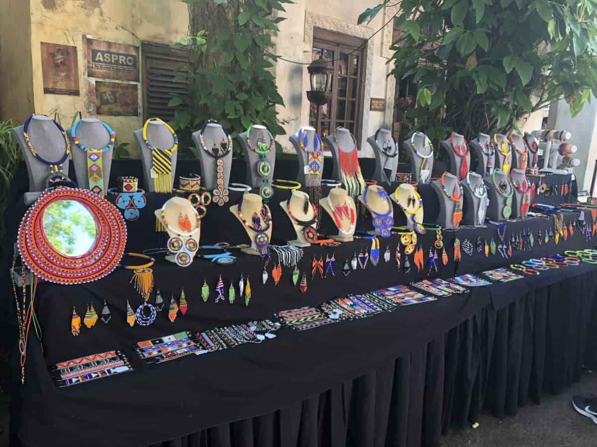 A long stable full of beaded necklaces on display