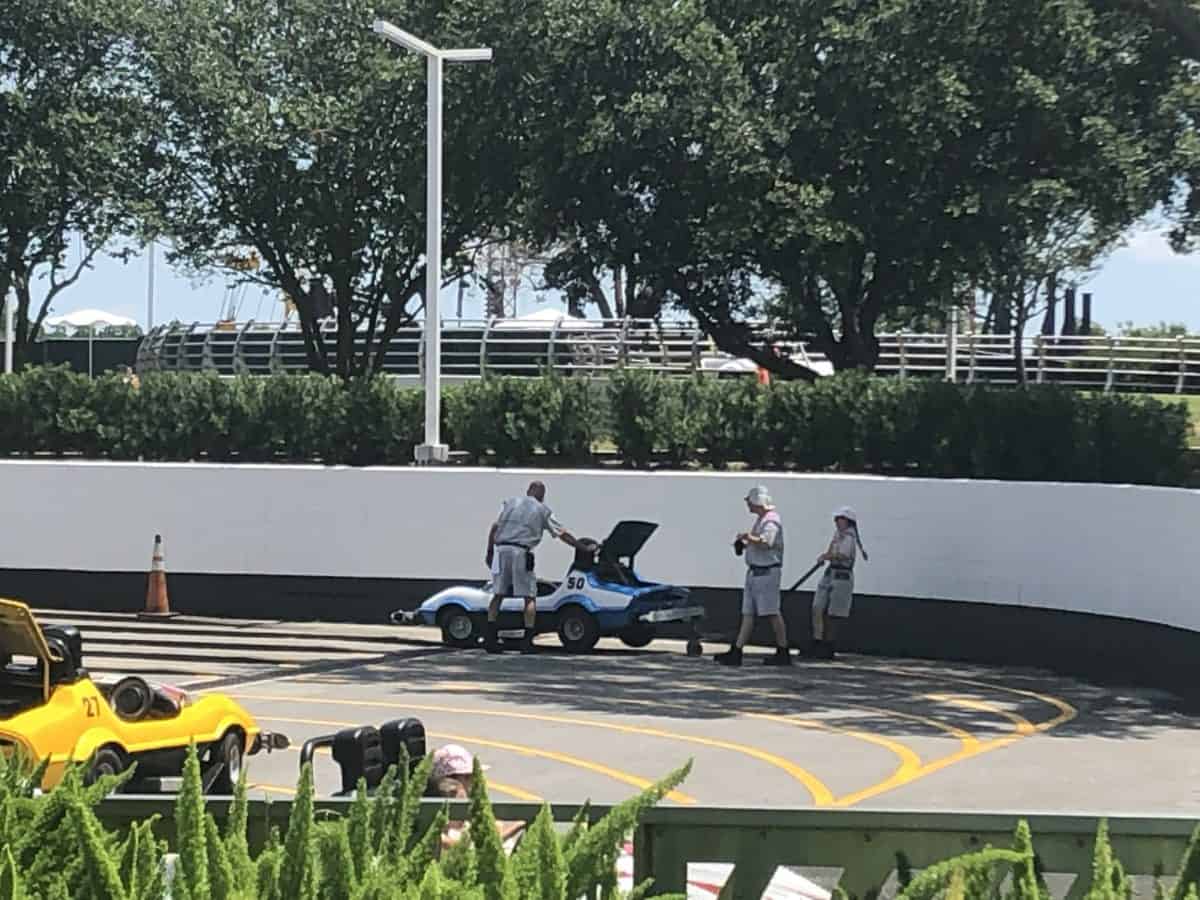 Tomorrowland Speedway Car Trouble, Cast Members moving the cars
