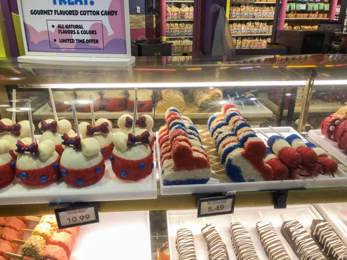 Red white and blue rice krispy treats, marshmallows and caramel apples