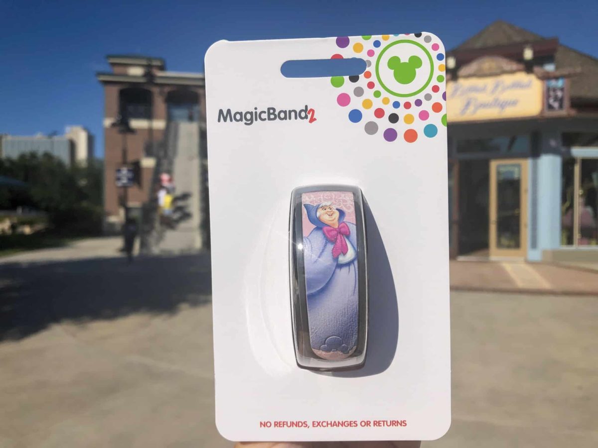 New Fairy Godmother MagicBand from Bibiidi Bobbidi Boutique with pale pink background and Cinderella's fairy godmother