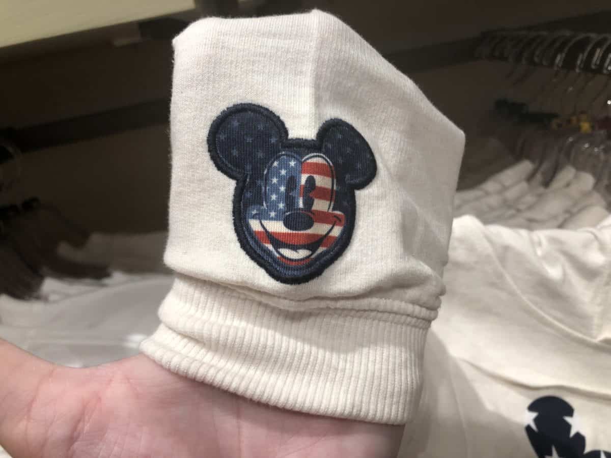 Mickey on the sleeve of the youth hoodie