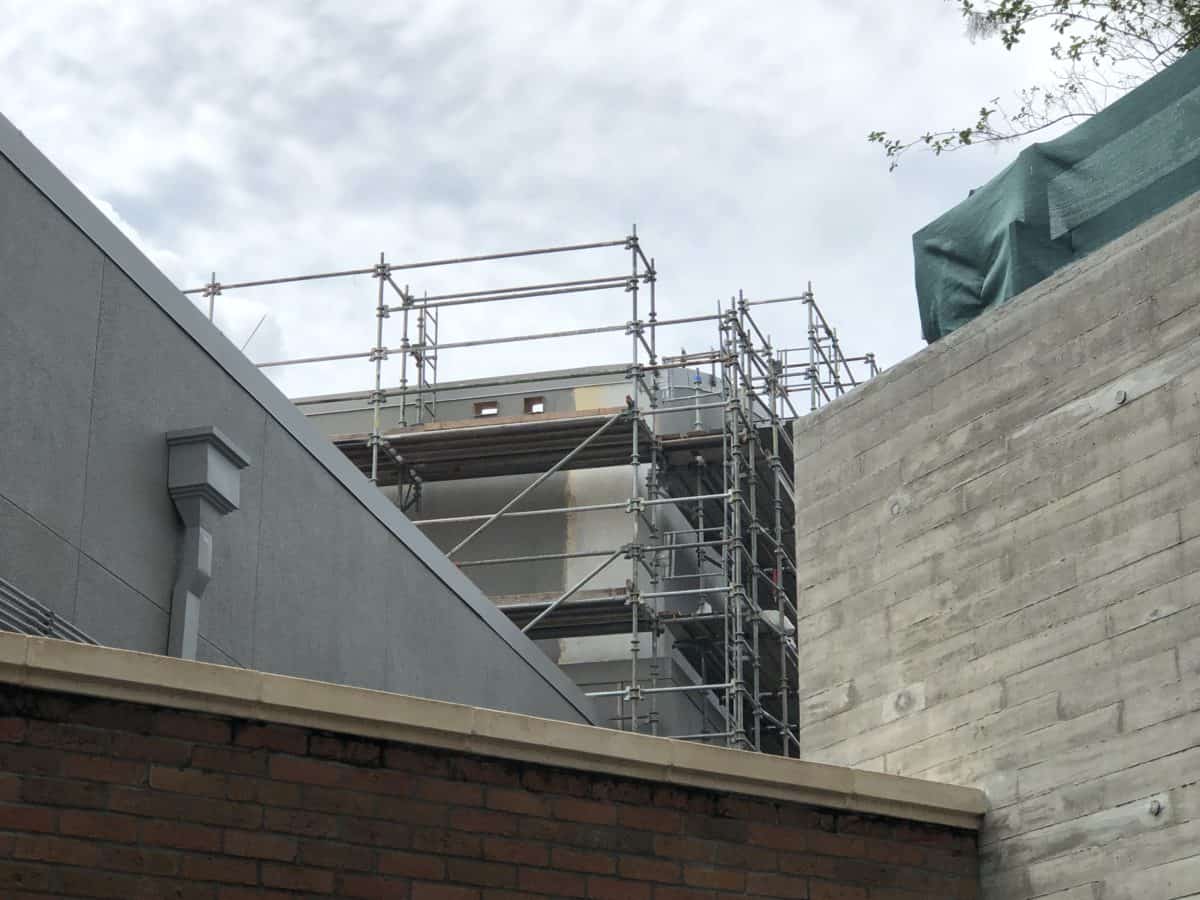 gray painting and scaffolding