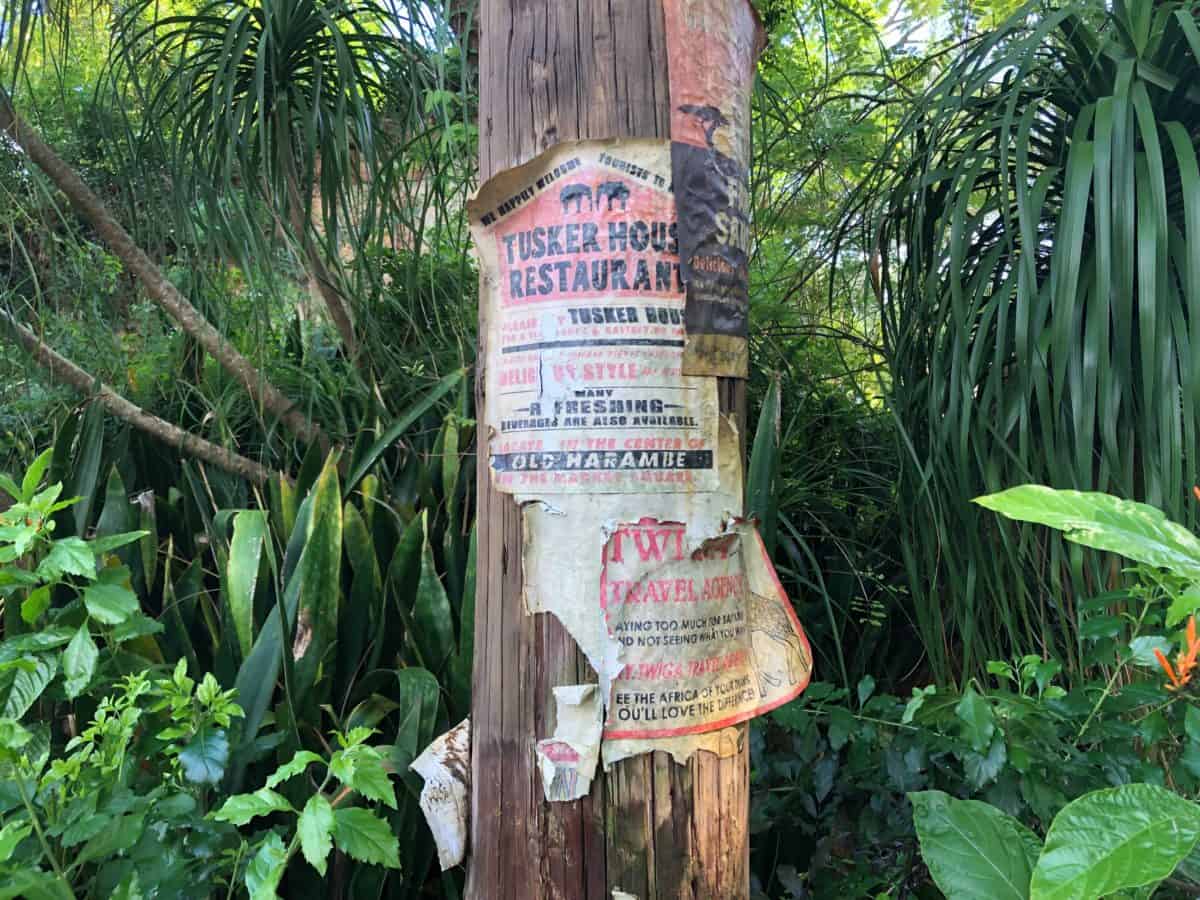 a torn sign on a post