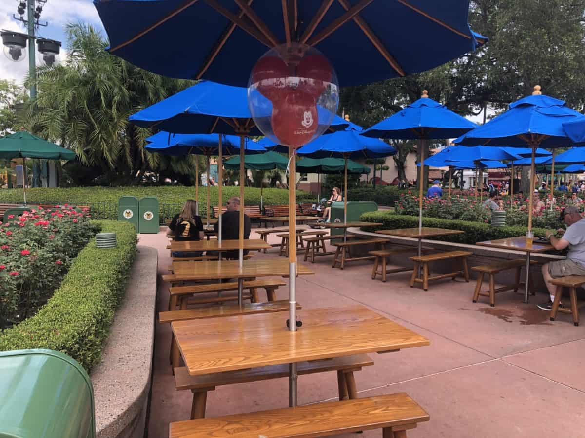Mickey balloon tied to a picnic table