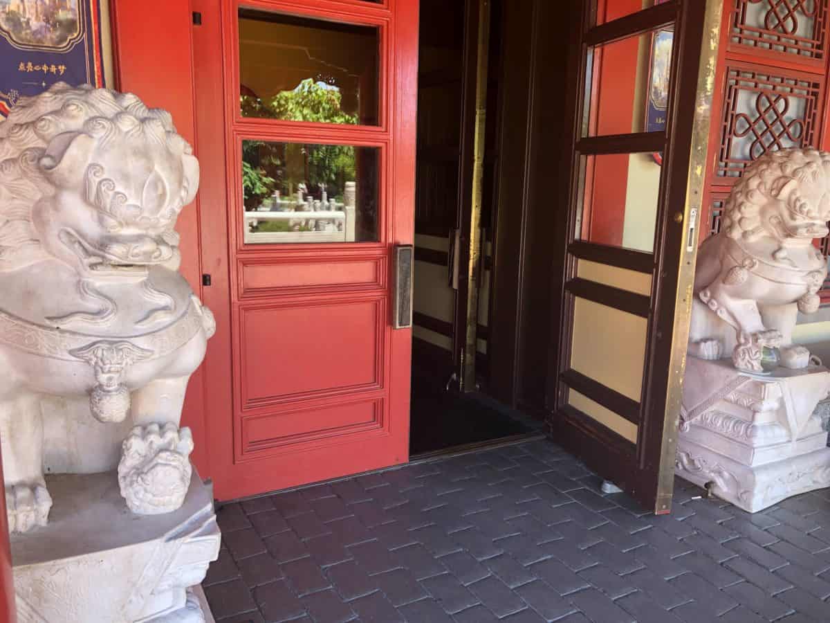 China door still missing a handle and propped open