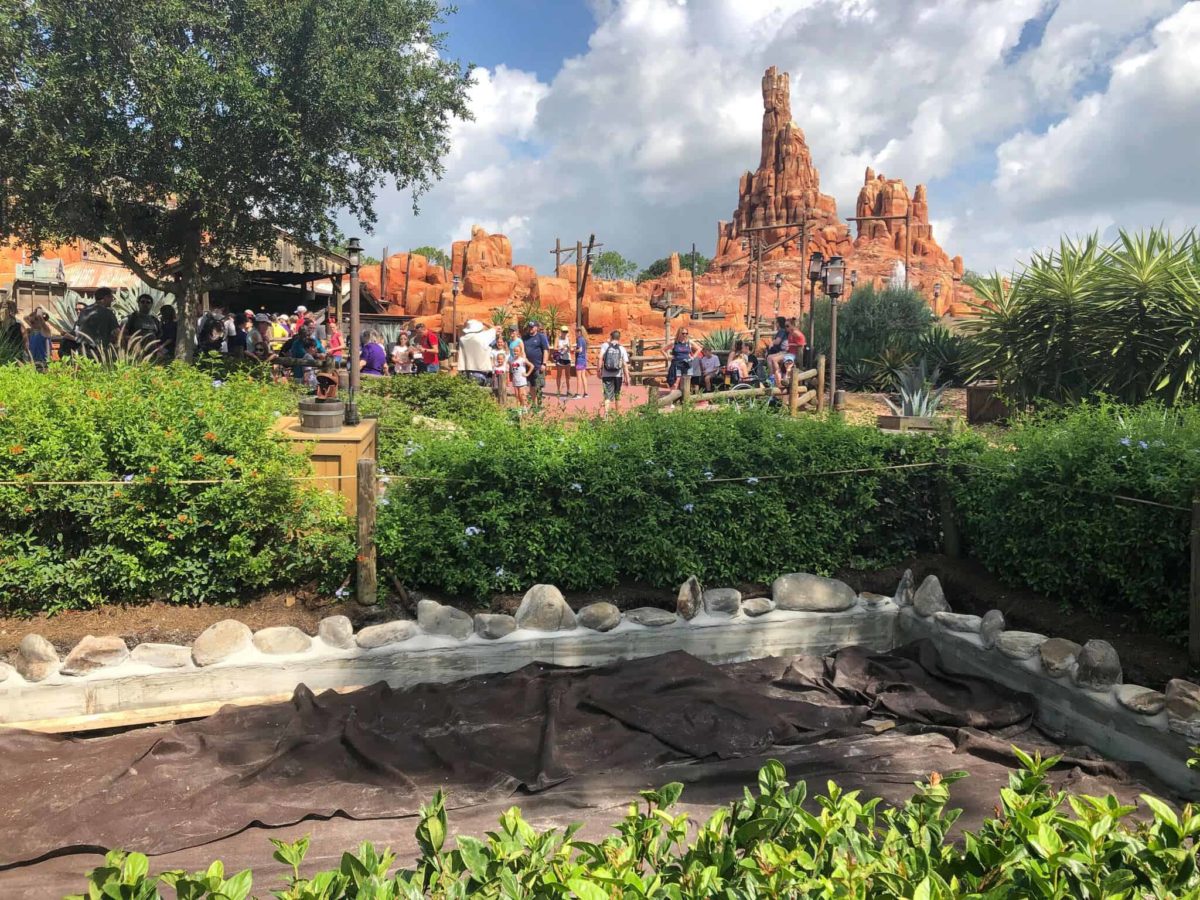 Thunder Mountain in the background, tarps on the ground